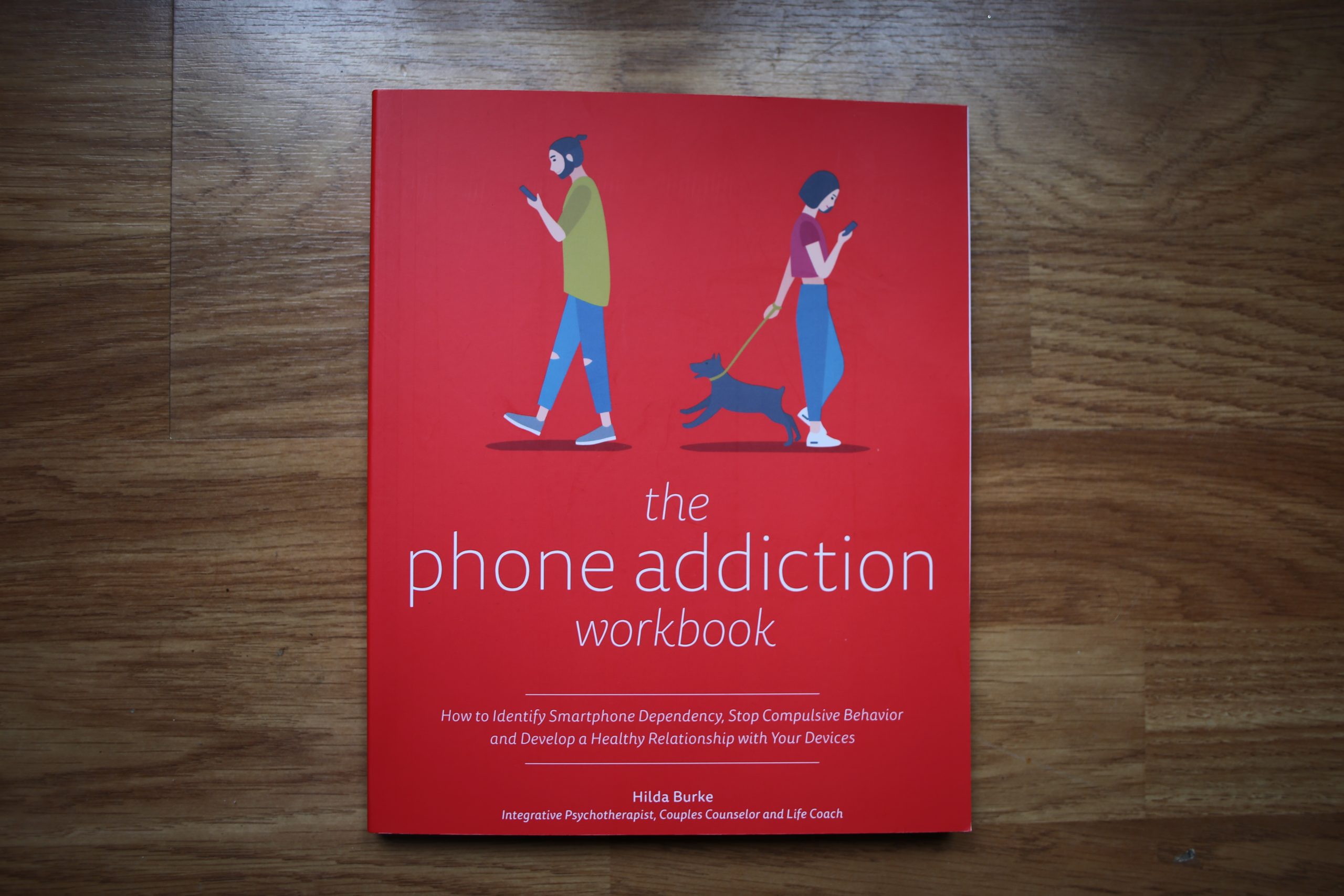 Photo shows book the phone addiction workbook, which I bought because of effective content marketing